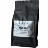 A bag of Mexico Sierra Azul coffee beans